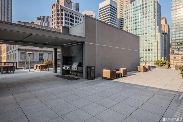 view of patio featuring a grill