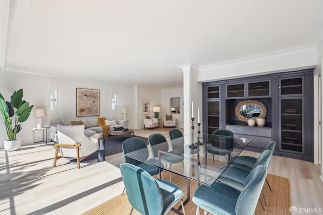 1333 Jones St Unit 508, San Francisco, CA 94109 - dining space featuring wood finished floors and ornamental molding