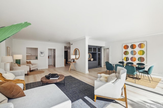 1333 Jones St Unit 508, San Francisco, CA 94109 - living room featuring ornamental molding, light wood-type flooring, and baseboards