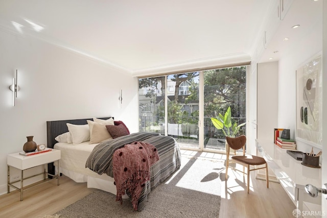 1333 Jones St Unit 508, San Francisco, CA 94109 - bedroom featuring access to exterior, light wood finished floors, crown molding, and floor to ceiling windows