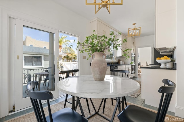 dining room featuring a notable chandelier