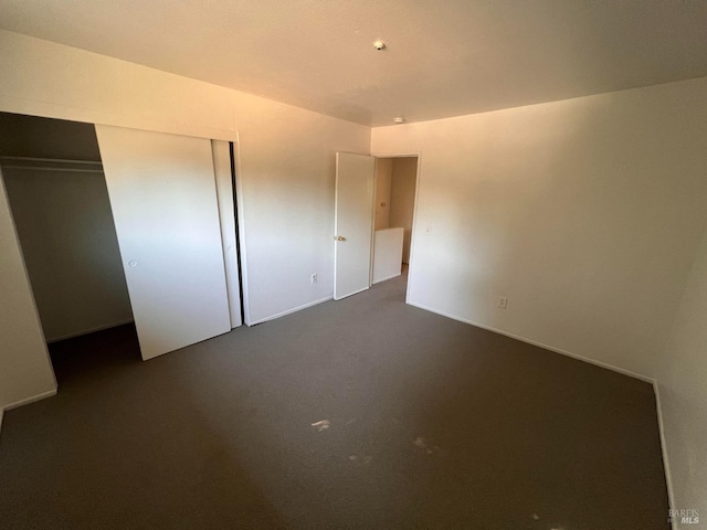 1080 Tijuana Ct, Santa Rosa, CA 95401 - unfurnished bedroom featuring dark carpet and a closet