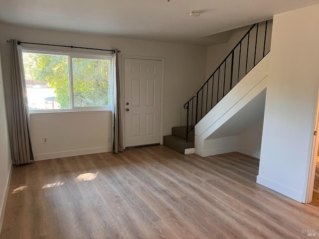 1080 Tijuana Ct, Santa Rosa, CA 95401 - entrance foyer with wood finished floors, stairs, and baseboards