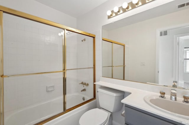 full bath featuring vanity, toilet, visible vents, and enclosed tub / shower combo