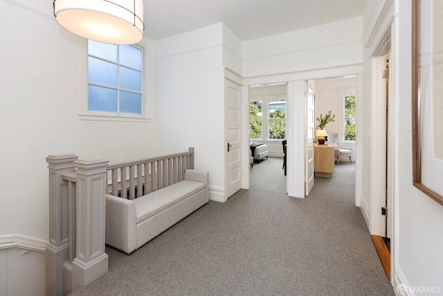 bedroom with carpet floors and a crib