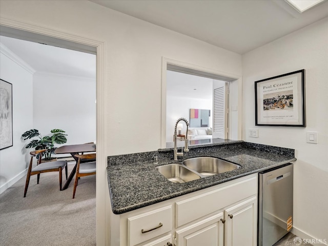 2790 19th Ave Unit 21, San Francisco, CA 94132 - kitchen featuring dishwasher, dark stone counters, light carpet, crown molding, and white cabinets