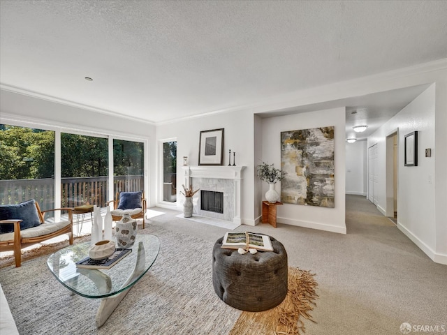 2790 19th Ave Unit 21, San Francisco, CA 94132 - living room featuring a textured ceiling, a tile fireplace, ornamental molding, and carpet flooring