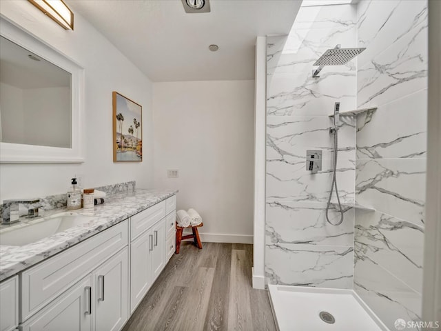 2790 19th Ave Unit 21, San Francisco, CA 94132 - bathroom with vanity, wood finished floors, and a marble finish shower