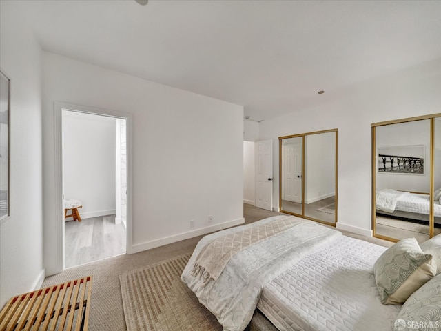 2790 19th Ave Unit 21, San Francisco, CA 94132 - bedroom featuring two closets and carpet floors