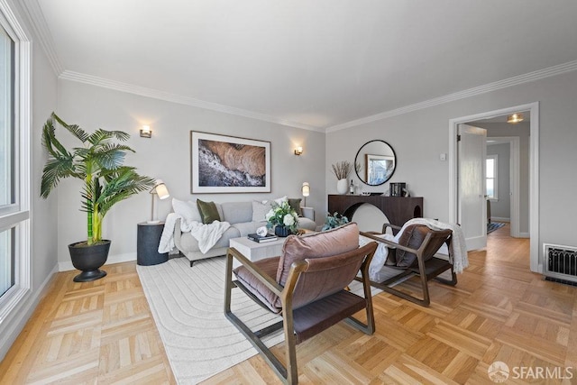 living room with light parquet floors and ornamental molding