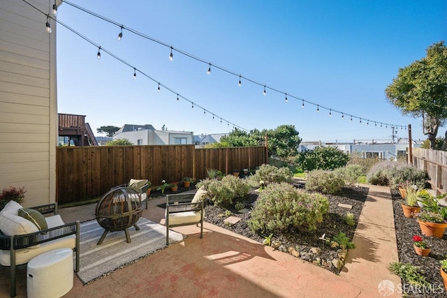 view of patio featuring a fire pit