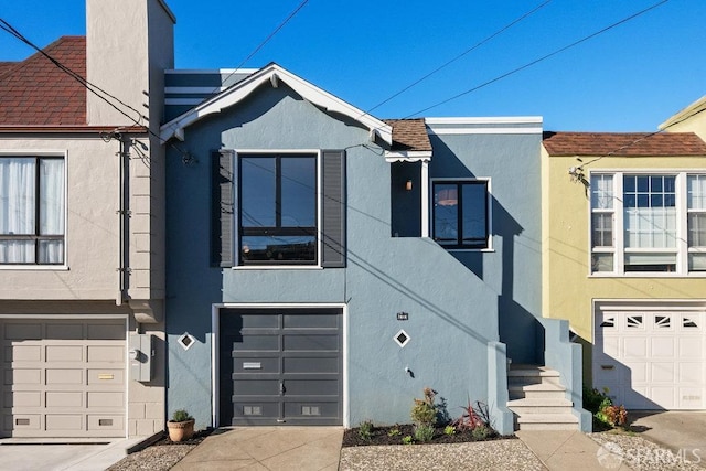 view of front of property featuring a garage