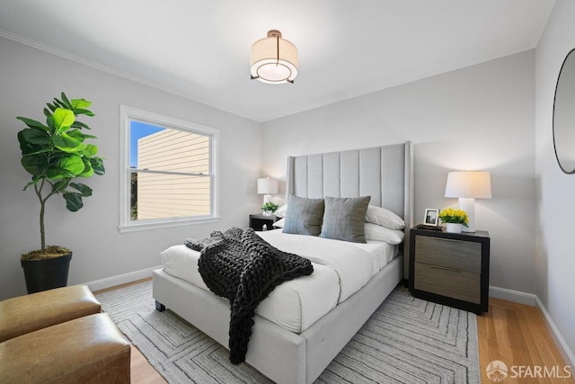 bedroom featuring light wood-type flooring