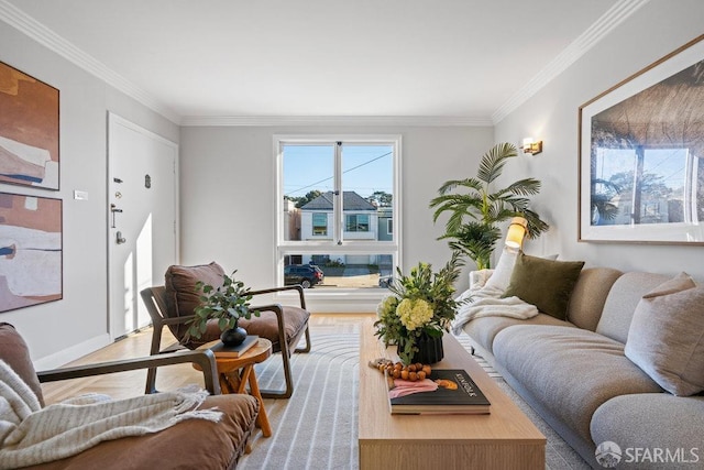 living room featuring crown molding and light hardwood / wood-style flooring