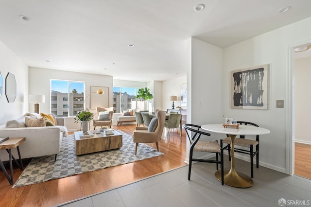 living room with tile patterned flooring