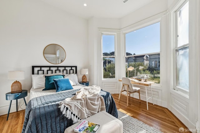 338 Scott St, San Francisco, CA 94117 - bedroom featuring wood finished floors and a desk