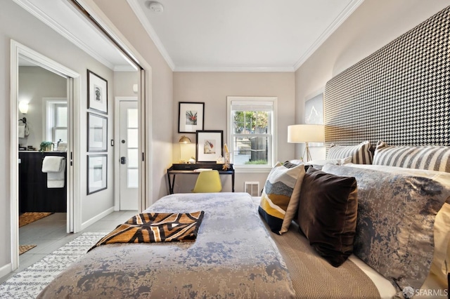 bedroom with tile patterned flooring, visible vents, and ornamental molding