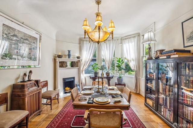 interior space with light parquet floors and a notable chandelier