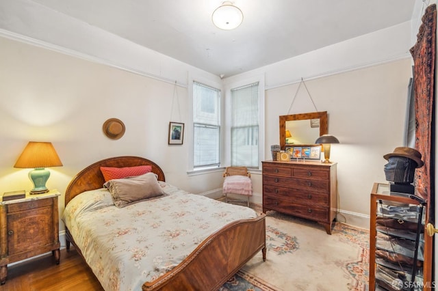 bedroom featuring hardwood / wood-style floors