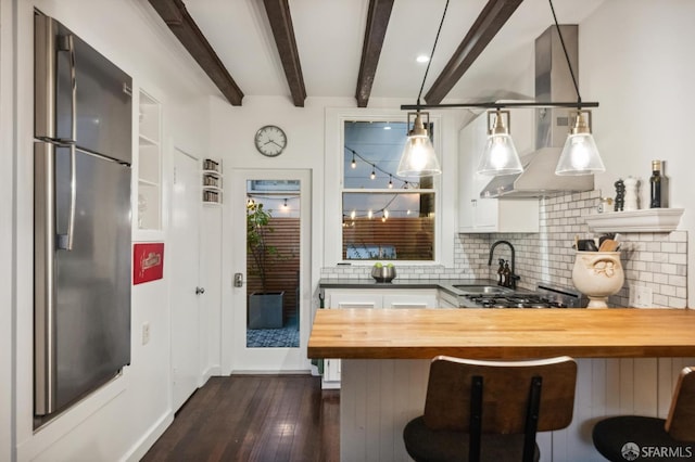 50 Perine Pl, San Francisco, CA 94115 - kitchen with wood counters, freestanding refrigerator, a sink, dark wood finished floors, and beam ceiling
