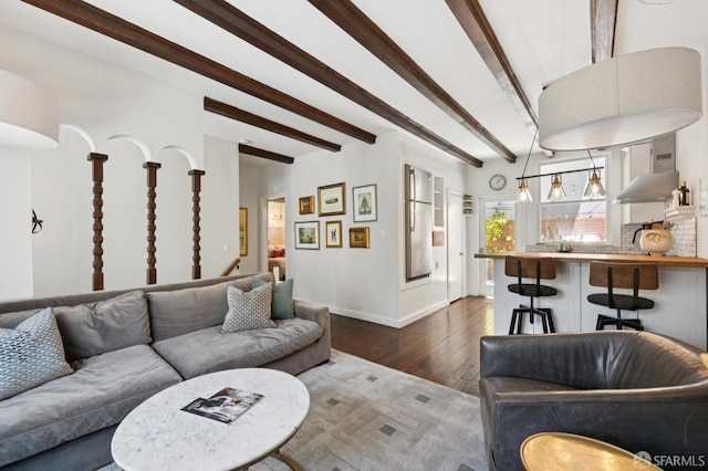 50 Perine Pl, San Francisco, CA 94115 - living area featuring dark wood finished floors, beamed ceiling, and baseboards