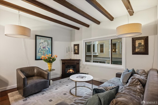 50 Perine Pl, San Francisco, CA 94115 - living room featuring beam ceiling, baseboards, a glass covered fireplace, and wood finished floors