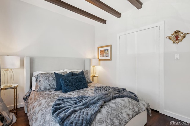 50 Perine Pl, San Francisco, CA 94115 - bedroom with beam ceiling, dark wood-style flooring, a closet, baseboards, and ceiling fan