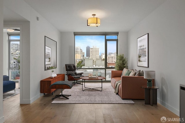 1545 Pine St Unit 802, San Francisco, CA 94109 - sitting room featuring wood finished floors and a city view
