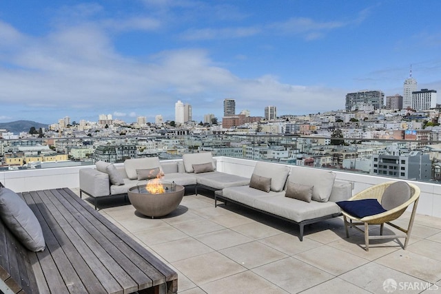 1545 Pine St Unit 802, San Francisco, CA 94109 - view of patio / terrace with an outdoor living space with a fire pit and a city view