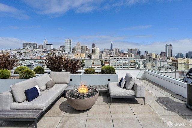 1545 Pine St Unit 802, San Francisco, CA 94109 - view of patio / terrace featuring an outdoor living space with a fire pit and a skyline view