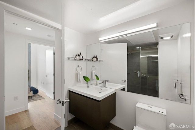 1545 Pine St Unit 802, San Francisco, CA 94109 - bathroom featuring vanity, wood finished floors, and a stall shower