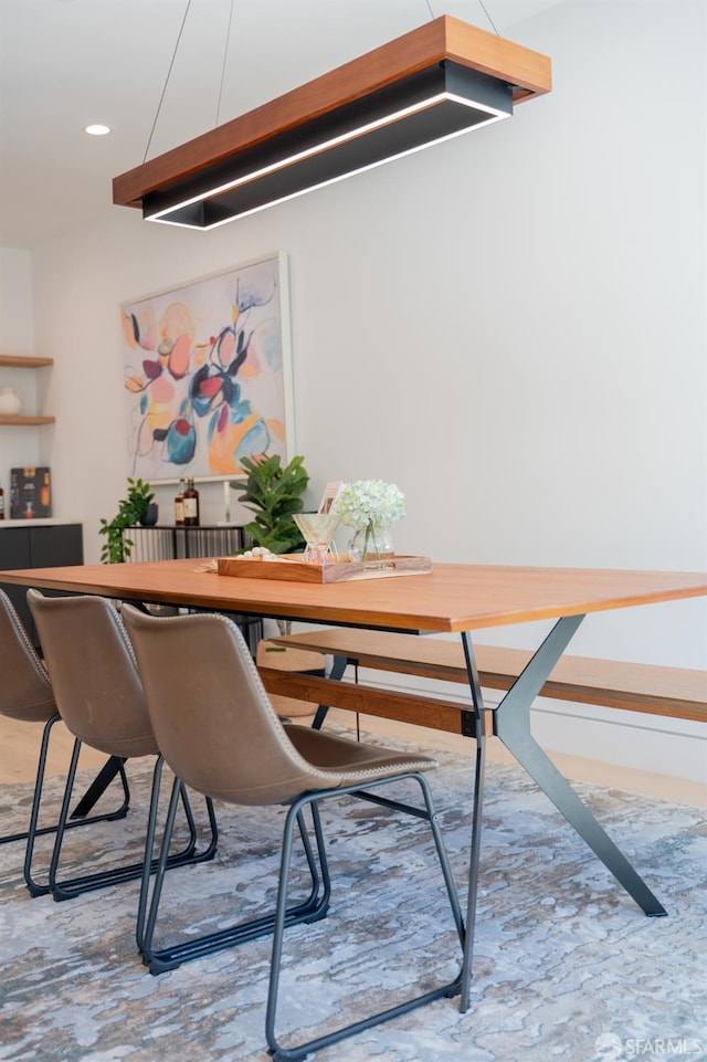 dining room with recessed lighting