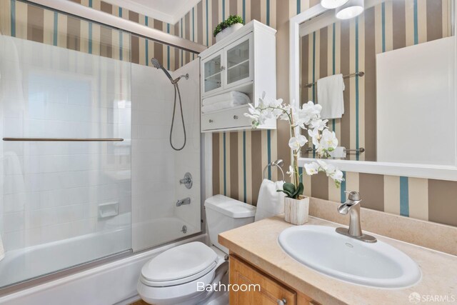 4471 Mission St Unit 2, San Francisco, CA 94112 - bathroom featuring wallpapered walls, vanity, combined bath / shower with glass door, and toilet