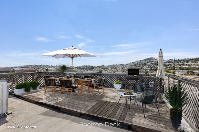 4471 Mission St Unit 2, San Francisco, CA 94112 - wooden terrace featuring outdoor dining area