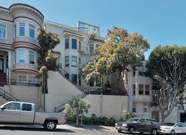 view of building exterior with stairway