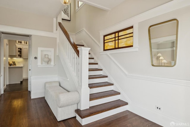 stairs with wood-type flooring