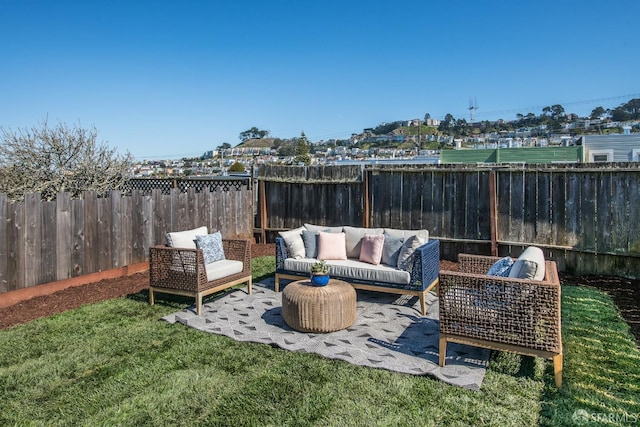 view of patio with an outdoor hangout area and a fenced backyard