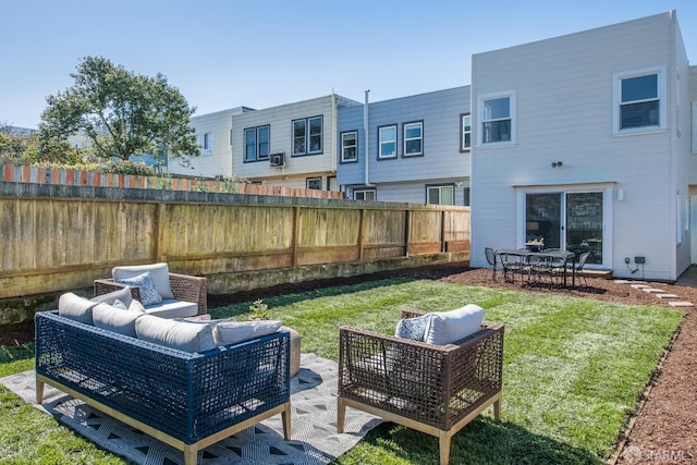 view of yard with a patio area, fence, and outdoor lounge area