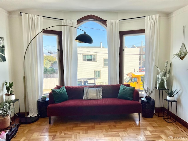 living area featuring light parquet flooring