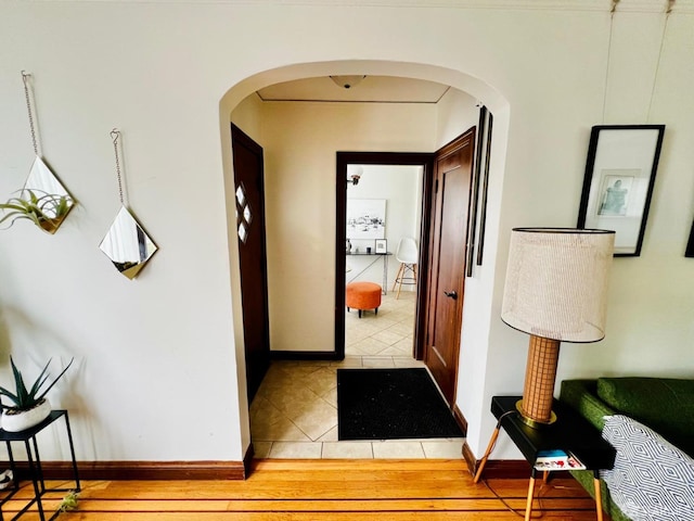 hall featuring tile patterned floors