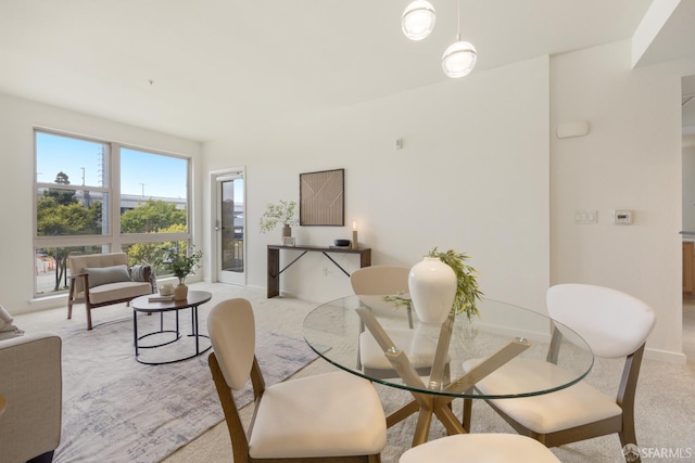 1488 El Camino Real Unit 212, South San Francisco, CA 94080 - dining space featuring light carpet and baseboards
