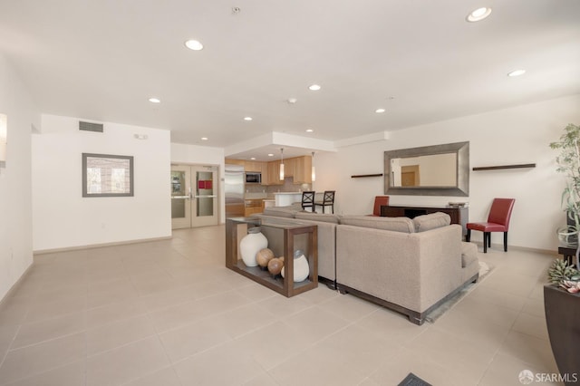 1488 El Camino Real Unit 212, South San Francisco, CA 94080 - living room with recessed lighting, light tile patterned flooring, and french doors