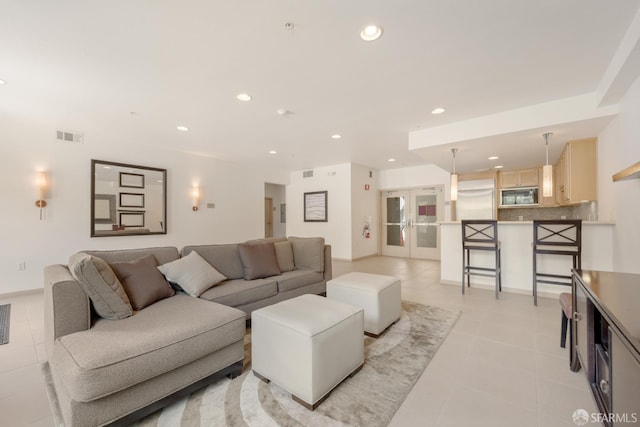 1488 El Camino Real Unit 212, South San Francisco, CA 94080 - living area featuring light tile patterned flooring, french doors, and recessed lighting
