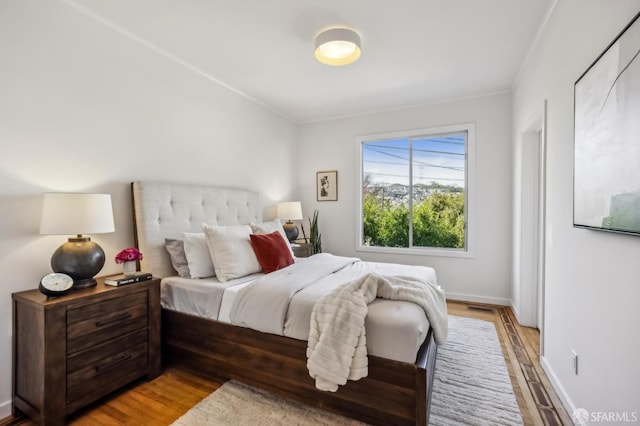 bedroom featuring light wood-type flooring