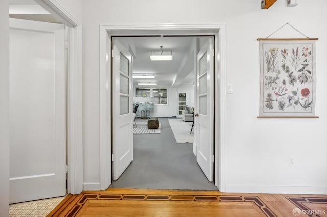 hall featuring wood-type flooring