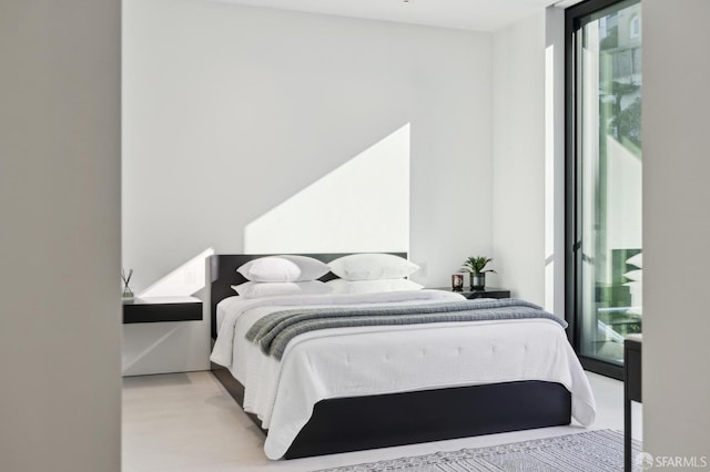 bedroom featuring light hardwood / wood-style floors