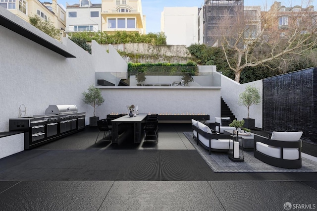 view of patio featuring outdoor lounge area and grilling area