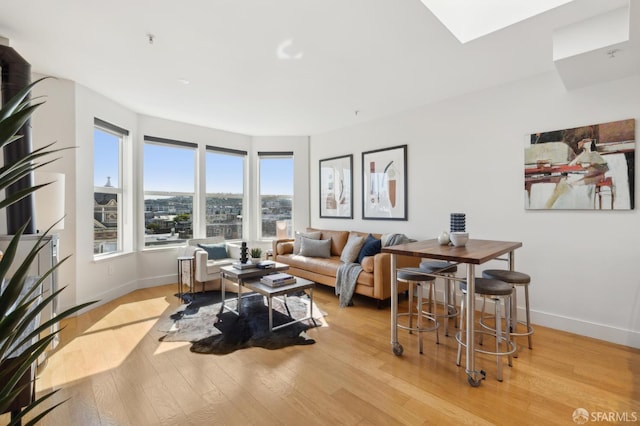 566 S Van Ness Ave Unit 31, San Francisco, CA 94110 - living room with light wood-style floors and baseboards
