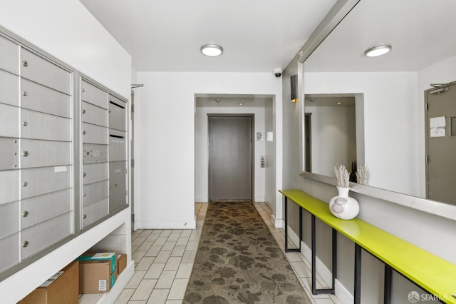 566 S Van Ness Ave Unit 31, San Francisco, CA 94110 - hallway featuring elevator and baseboards