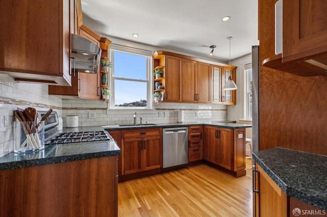 207 Eureka St, San Francisco, CA 94114 - kitchen featuring stainless steel dishwasher, brown cabinetry, light wood-style flooring, stove, and recessed lighting
